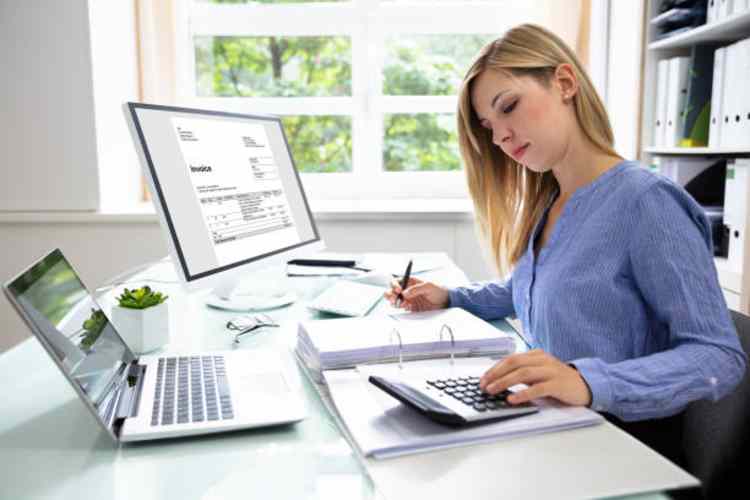 woman-laptop-accounting-calculator