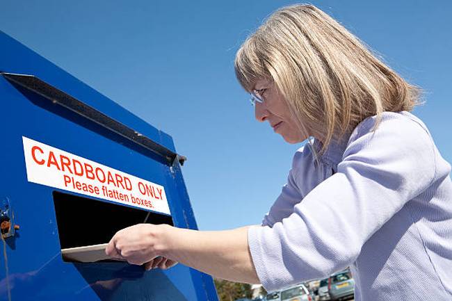 woman-recycling-cardboard