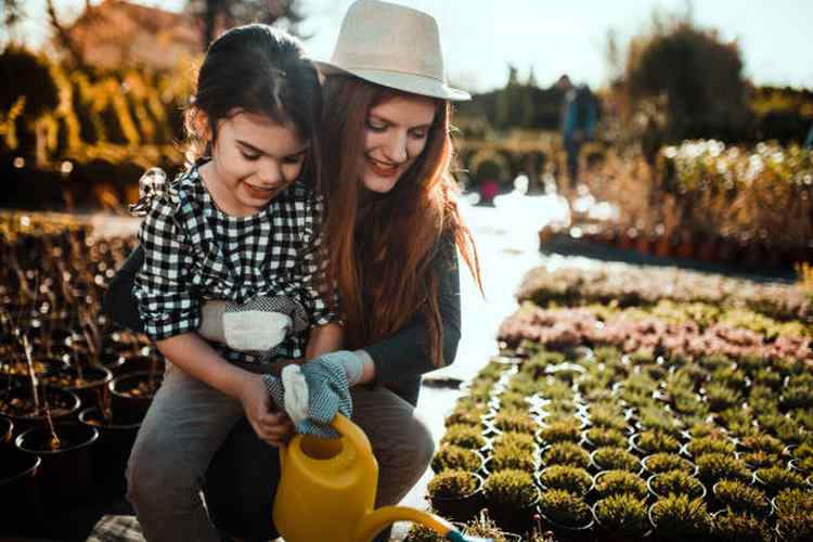 mother-daughter-girl-gardening